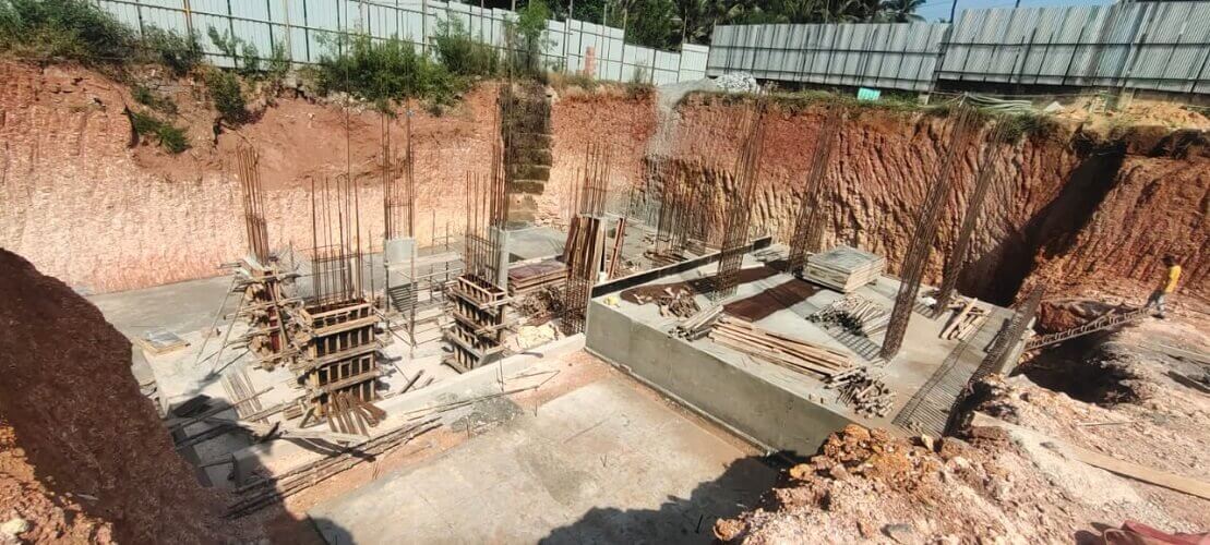 Foundation is laid with concrete applied to it.