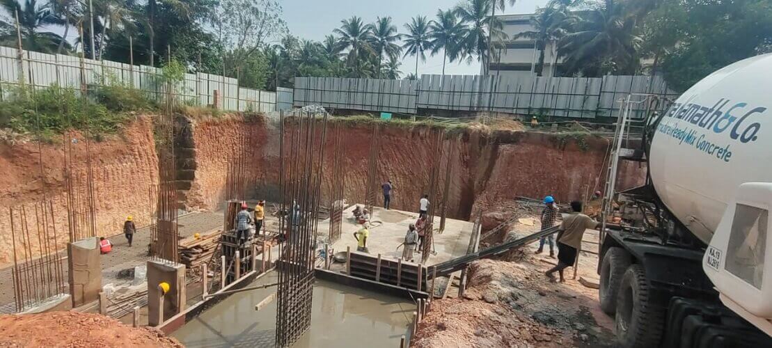 To make the foundation, they used ready mix concrete to fill the space.