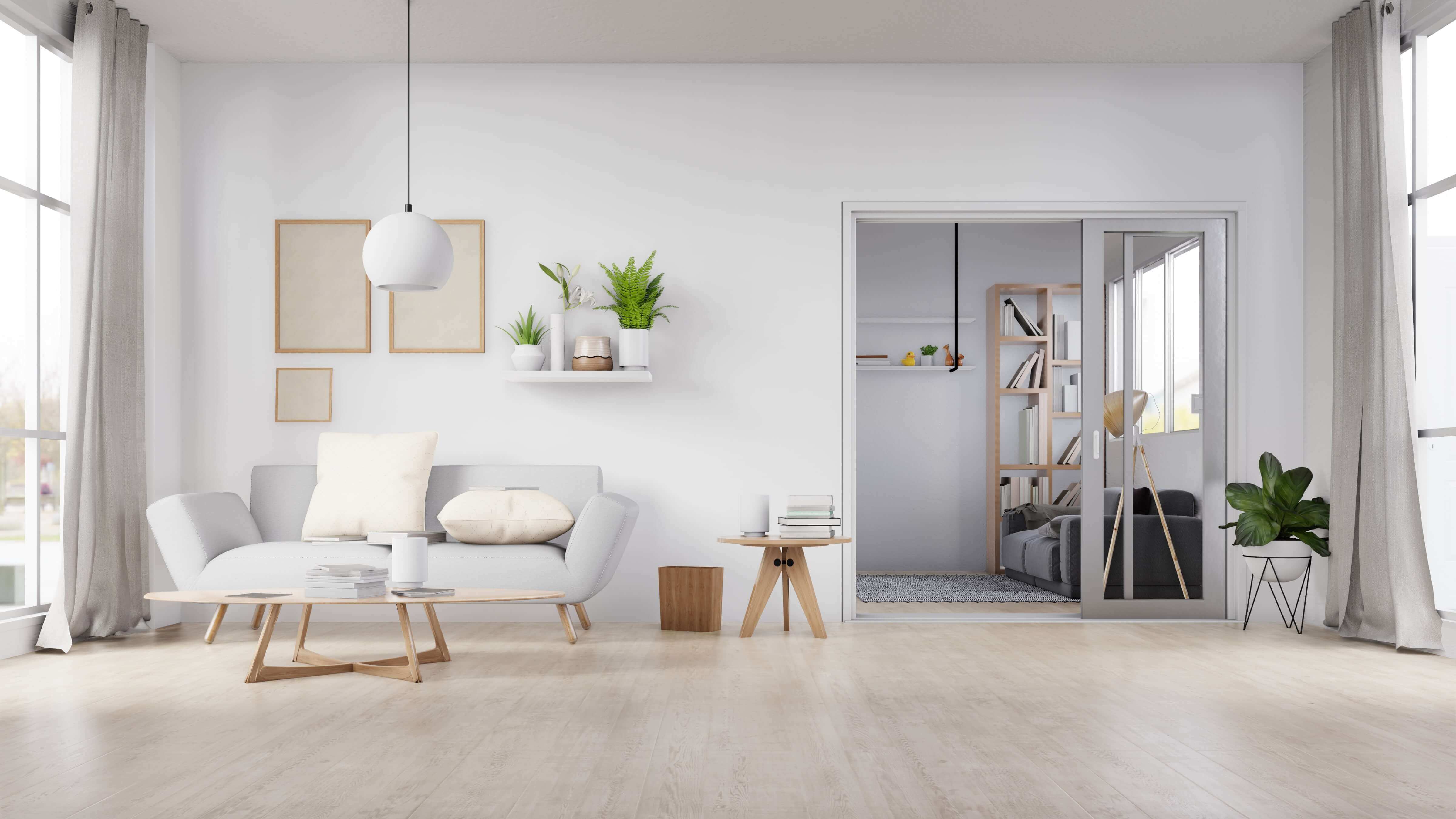 Neutral-toned family room with comfortable seating and white furniture.