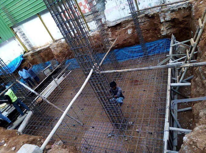 Steel structures are laid in the foundation to make residental apartments for sale in Yelahanka new town.